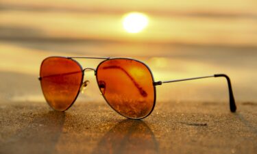 Beach sunglasses at sunset